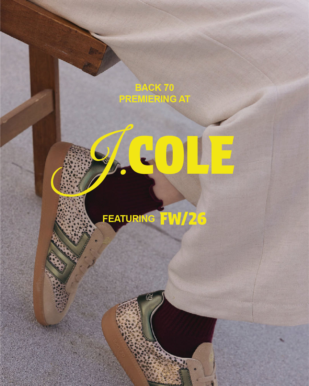 Close-up of leopard print sneakers with green accents and maroon socks from the Back 70 FW26 collection.