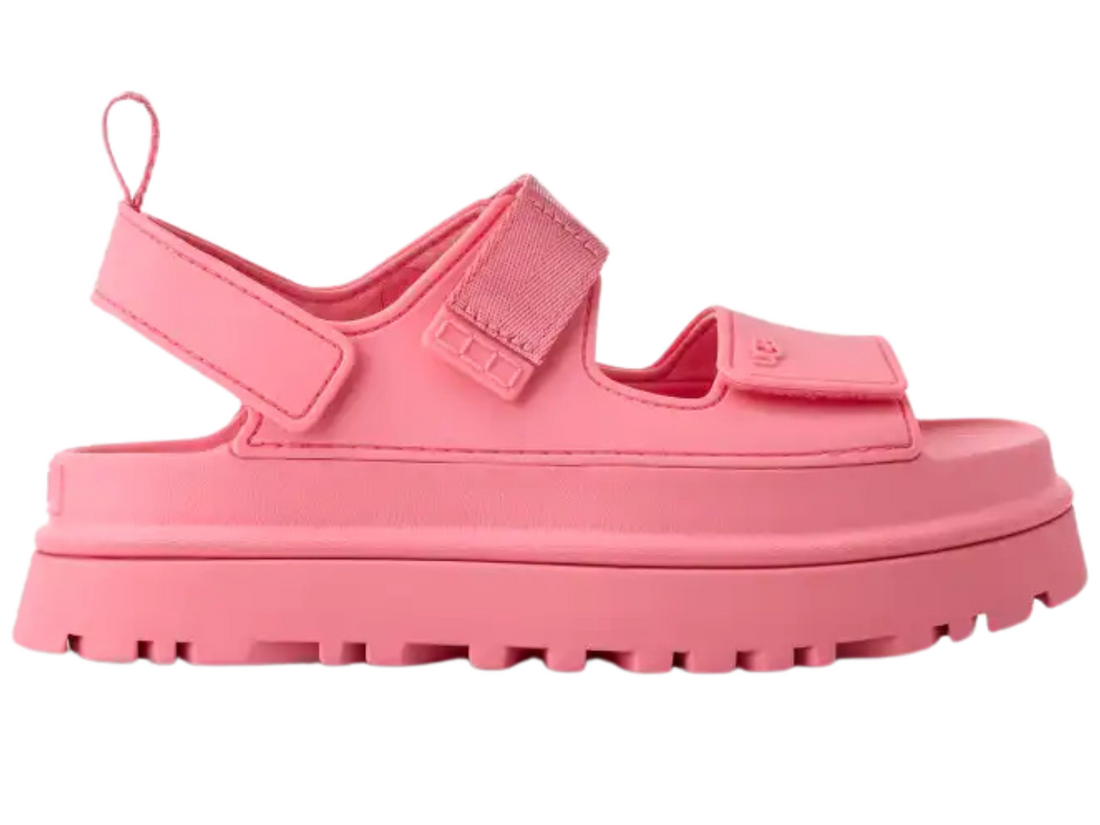 Bright pink platform sandals with wide adjustable straps and a chunky lug sole