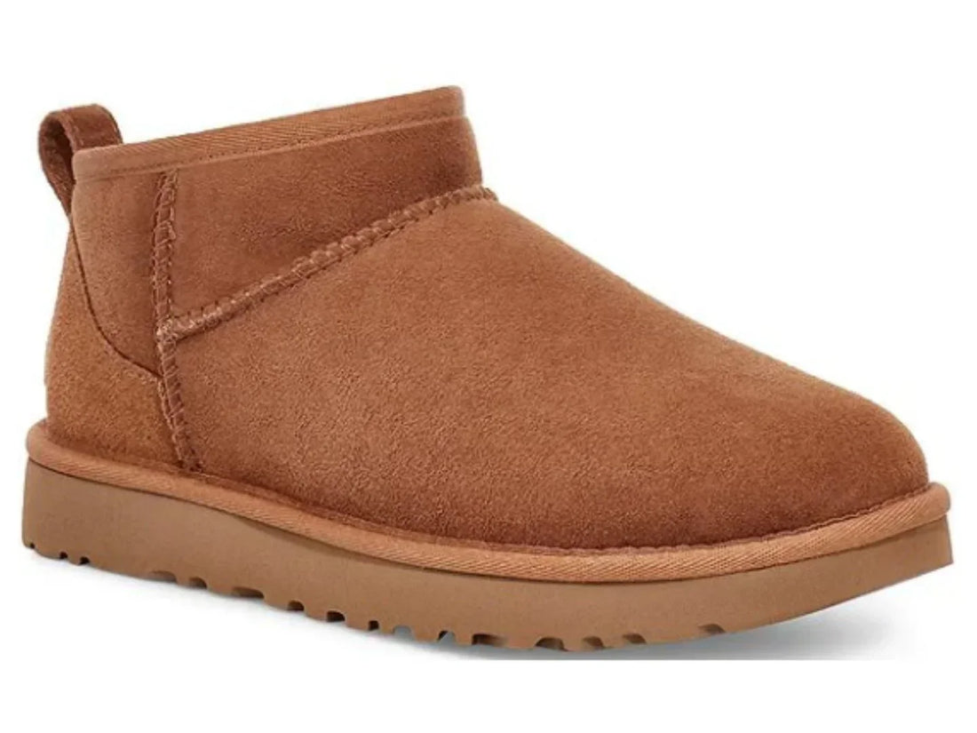 Chestnut brown suede ankle boot with a thick rubber sole
