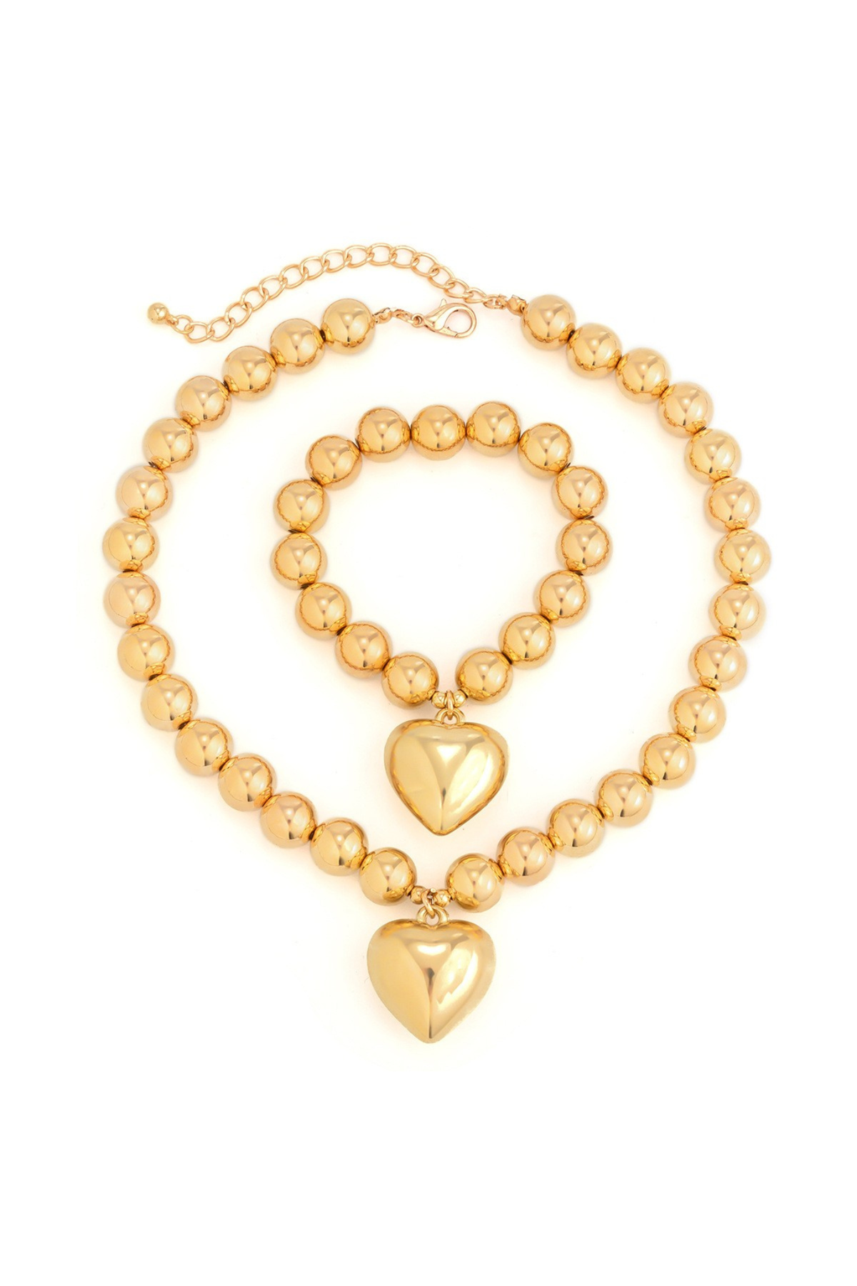 Gold-tone beaded necklace and bracelet set with heart-shaped pendants, displayed on a clean white background. at J.Cole Shoes