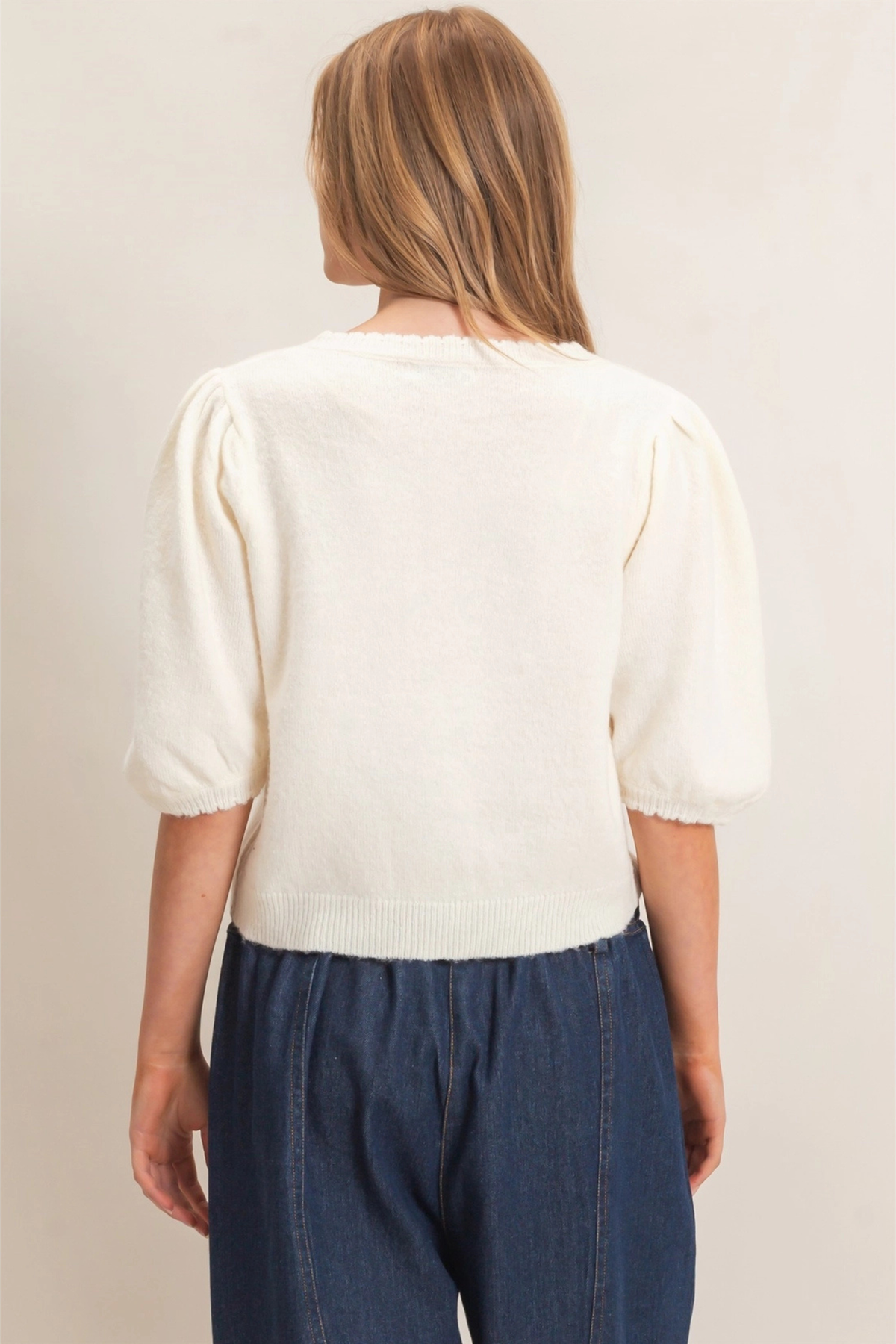 back of cream puff sleeve cardigan