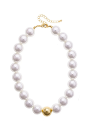 A pearl necklace with a gold clasp and a single gold bead accent at the bottom center, displayed on a clean white background.
