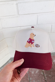 crimson and white trucker hat with golden retriever at jcole shoes tulsa