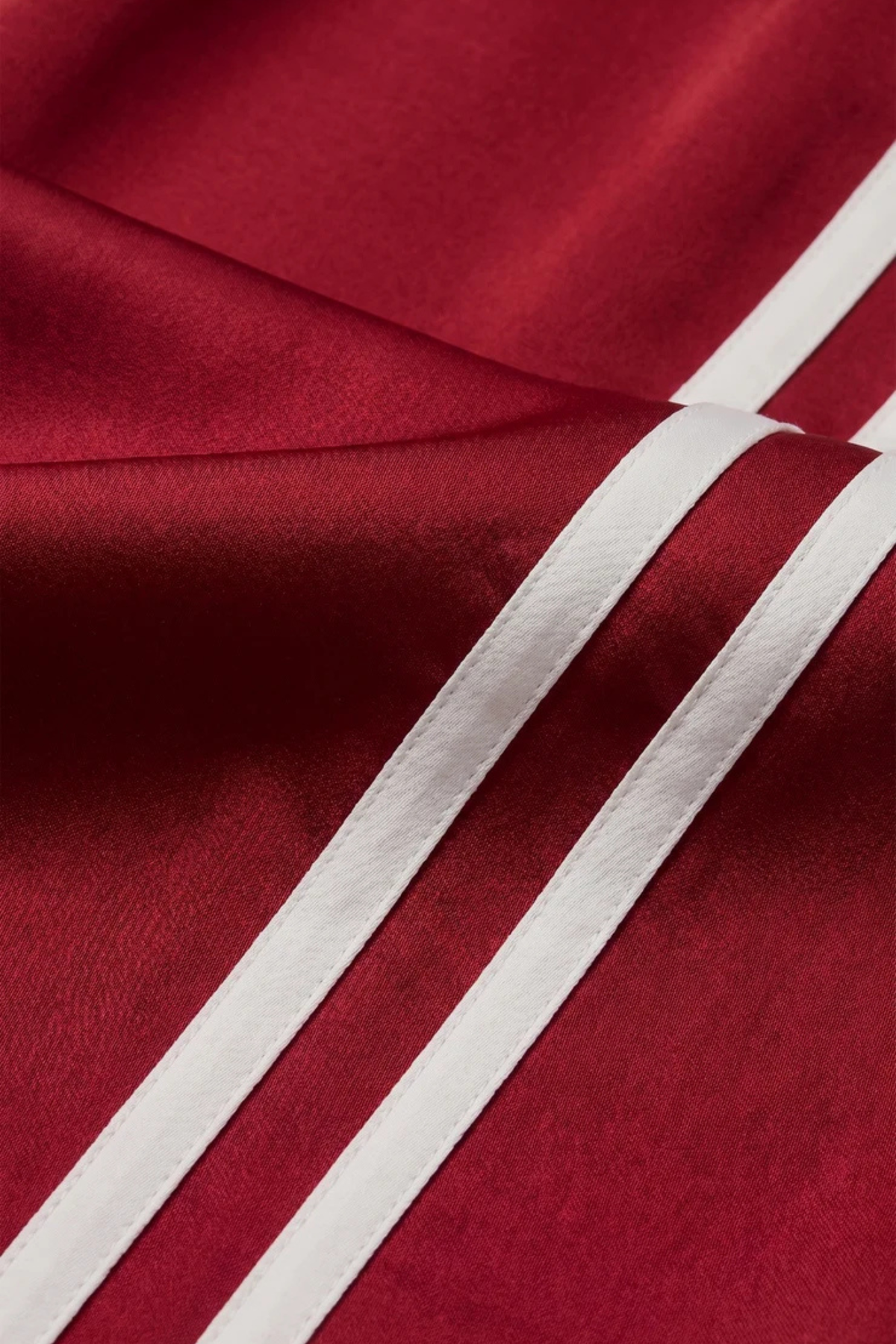 red s with white stripe track pants at jcole shoes tulsa