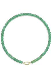 A beaded necklace made of small green faceted beads with a gold oval clasp, displayed on a clean white background.