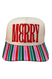 A festive trucker-style cap featuring the word 'MERRY' in bold red embroidery on an off-white crown, with a flat brim covered in vertical Christmas stripes of red, green, pink, and white.