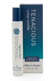 Tenacious crisp vanilla roll-on perfume oil by Mix-o-logie, shown as a white bottle with a dark blue cap next to its blue and teal gradient packaging box.