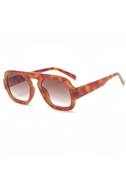 Square aviator-style sunglasses with a translucent tortoiseshell frame and gradient brown lenses, shown on a plain white background.