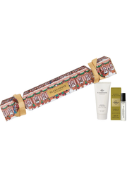 Glasgow Festival Collection by Glasgow Airport gift set featuring a Christmas-themed cracker box, a white body wash tube, and a small travel perfume sample vial with its olive green box, on a plain white background.