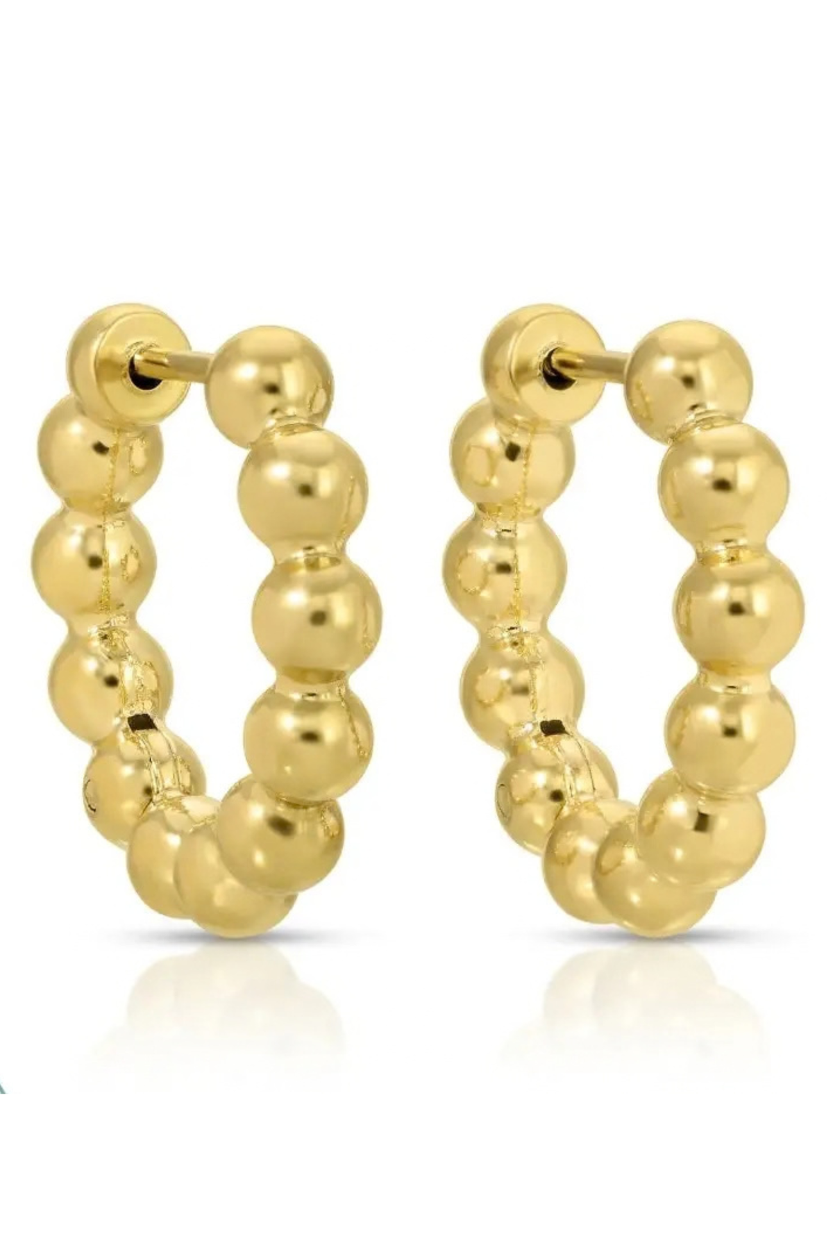 A pair of gold hoop earrings with a textured, beaded bubble design, shown on a clean white background with a soft reflection below.