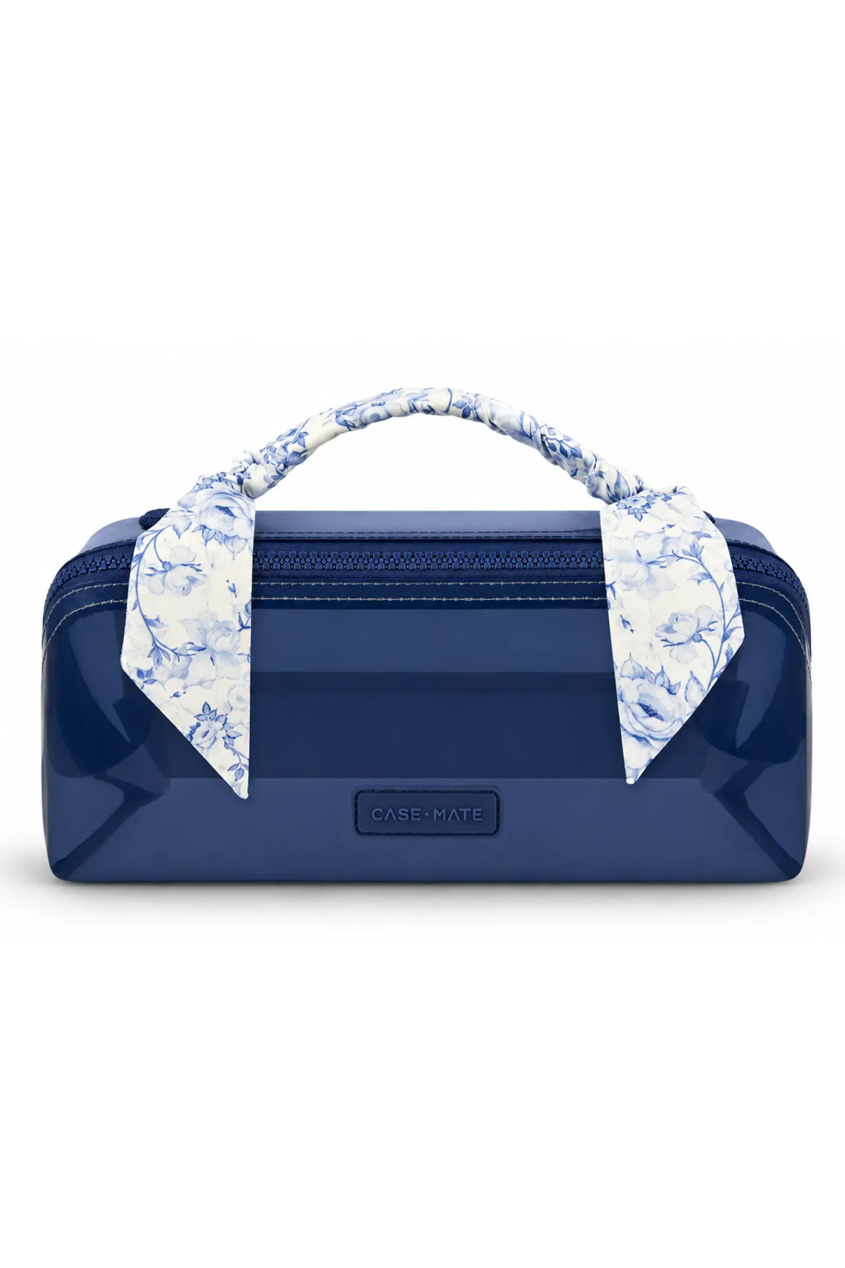 A glossy navy blue cosmetic case with a top zipper, featuring a matching navy and white floral patterned fabric handle and two matching fabric ties, on a white background.