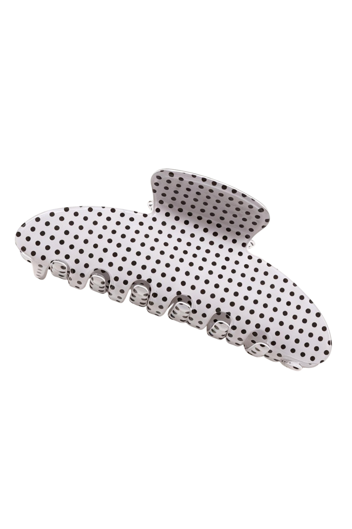 A white hair claw clip decorated with a black polka dot pattern, shown against a plain white background.
