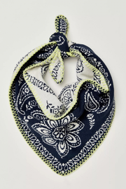 Navy blue bandana with white paisley pattern on a light gray background