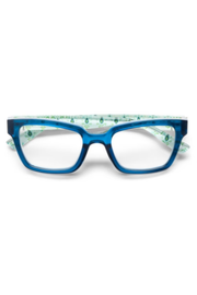 Blue acetate eyeglass frames with a clear plastic inner temple cover featuring a green pattern, shown against a plain white background.