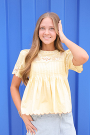 Zoe and Claire: Embroidered Pleated Top