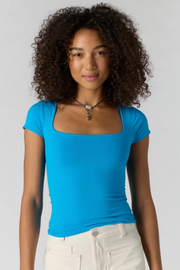 Free People: Sunfade Clean Lines Baby Tee in Hyper Teal