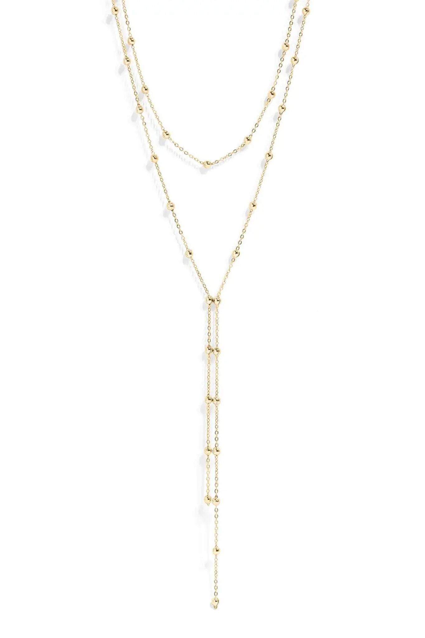 A delicate gold Y-necklace featuring three layered chains with small bead details and a long dangling fringe, shown on a plain white background.