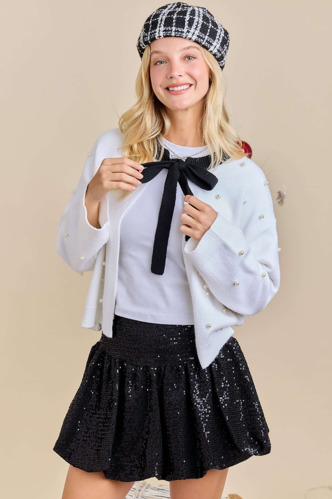 Main Strip: White Neck Tie Cardigan With Pearls Studs