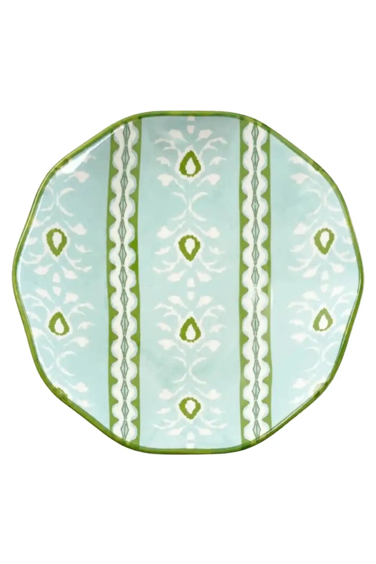 A scalloped ceramic plate with a light aqua background, featuring vertical white and green geometric patterns and a scalloped green rim.