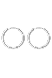 A pair of silver-toned metal hoop earrings shown against a plain white background.