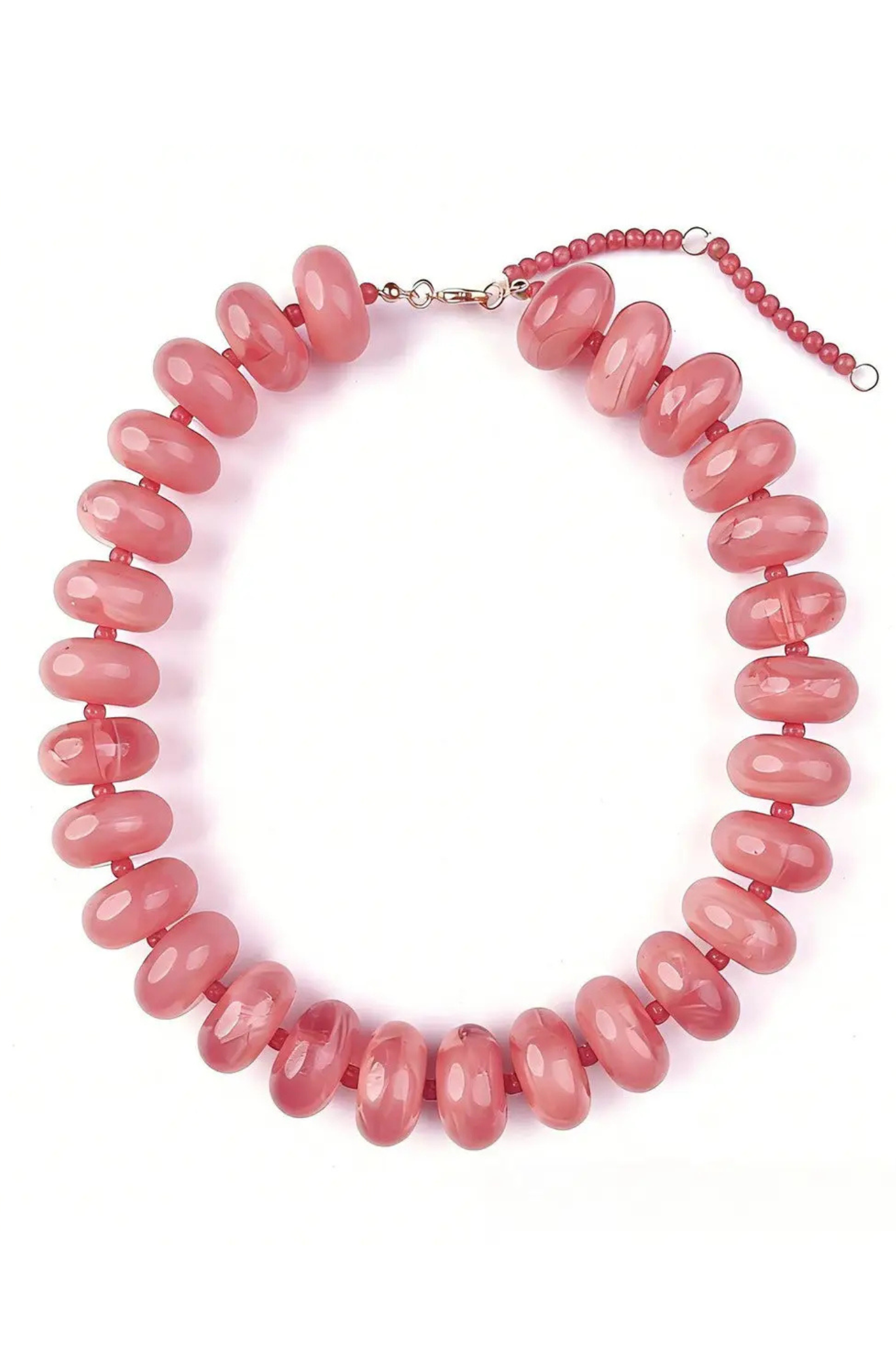 A chunky beaded necklace made of glossy, rounded dusty pink beads, featuring a silver-tone clasp and a matching red beaded extender chain with a silver ring, displayed on a clean white background.