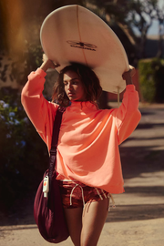 Free People Movement: A Cut Above Mock Neck in Neon Coral