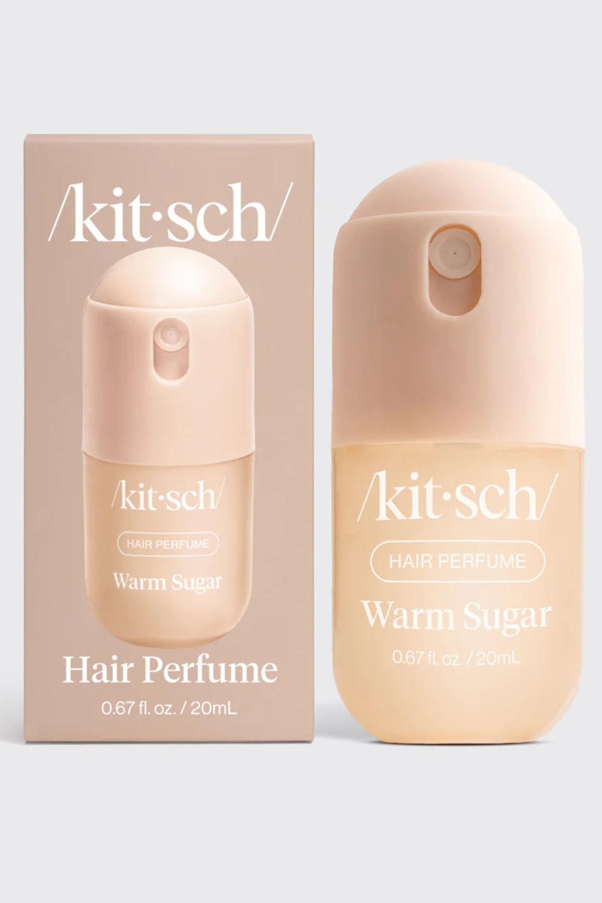 Kit Sch Warm Sugar hair perfume bottle and its matching outer packaging box, both in a soft peach-beige color, set against a light gray background.