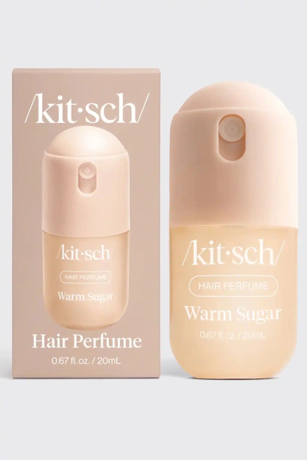 Kit Sch Warm Sugar hair perfume bottle and its matching outer packaging box, both in a soft peach-beige color, set against a light gray background.