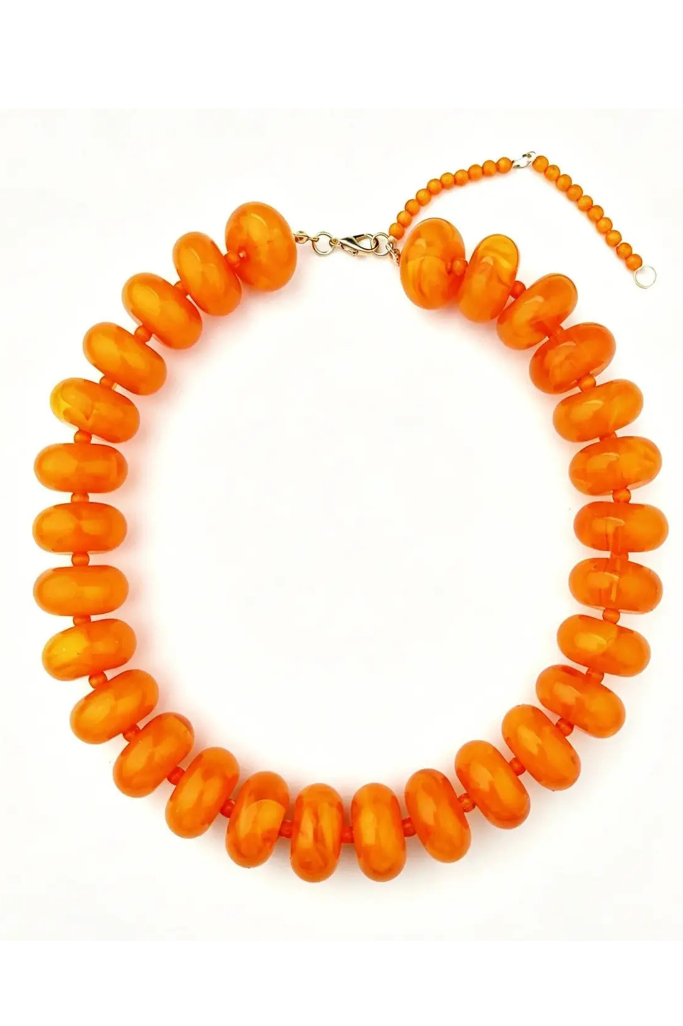 An orange beaded necklace with chunky, rounded disc-shaped beads and a silver-tone clasp, displayed on a clean white background.