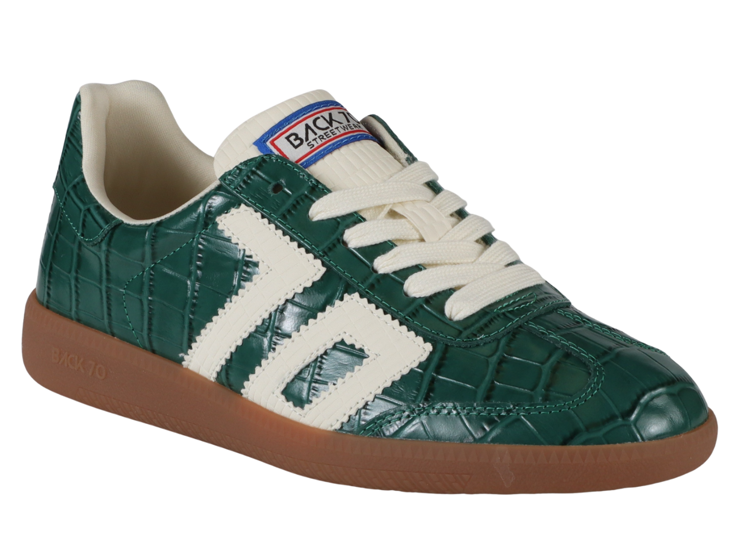 Green crocodile-patterned sneaker with white laces and brown sole on a white background