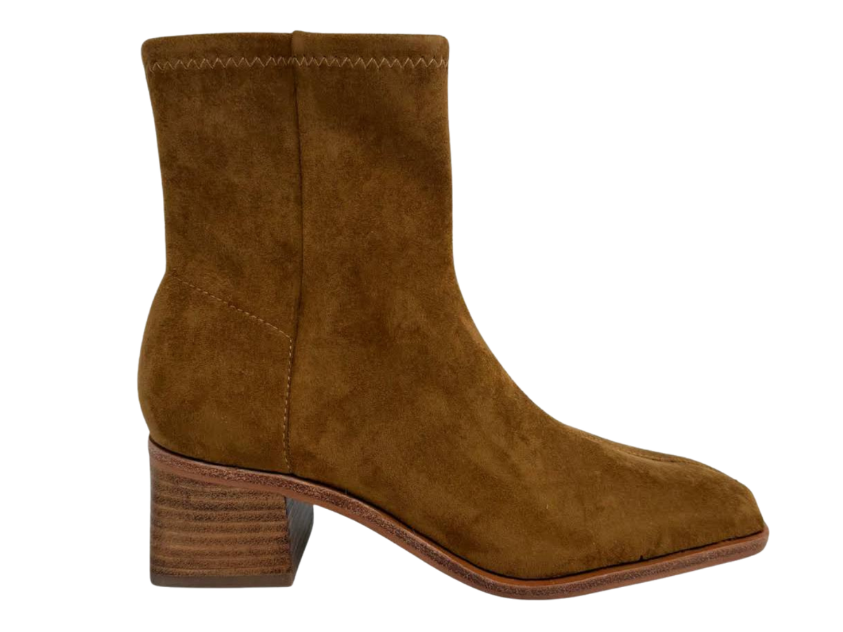 A single brown suede ankle boot with a stacked wood-look block heel, shown from a side profile on a white background.