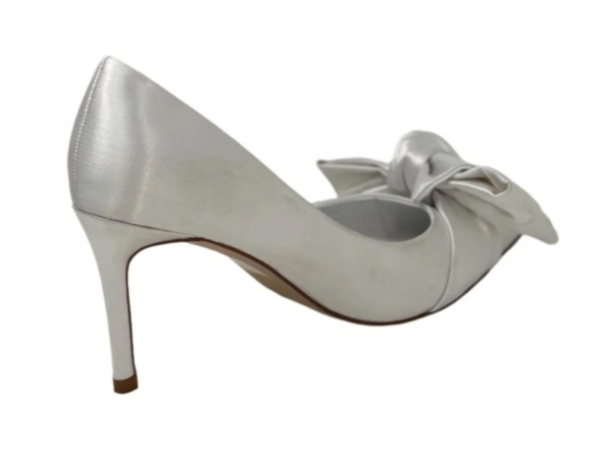 white heels with a bow at jcole shoes tulsa
