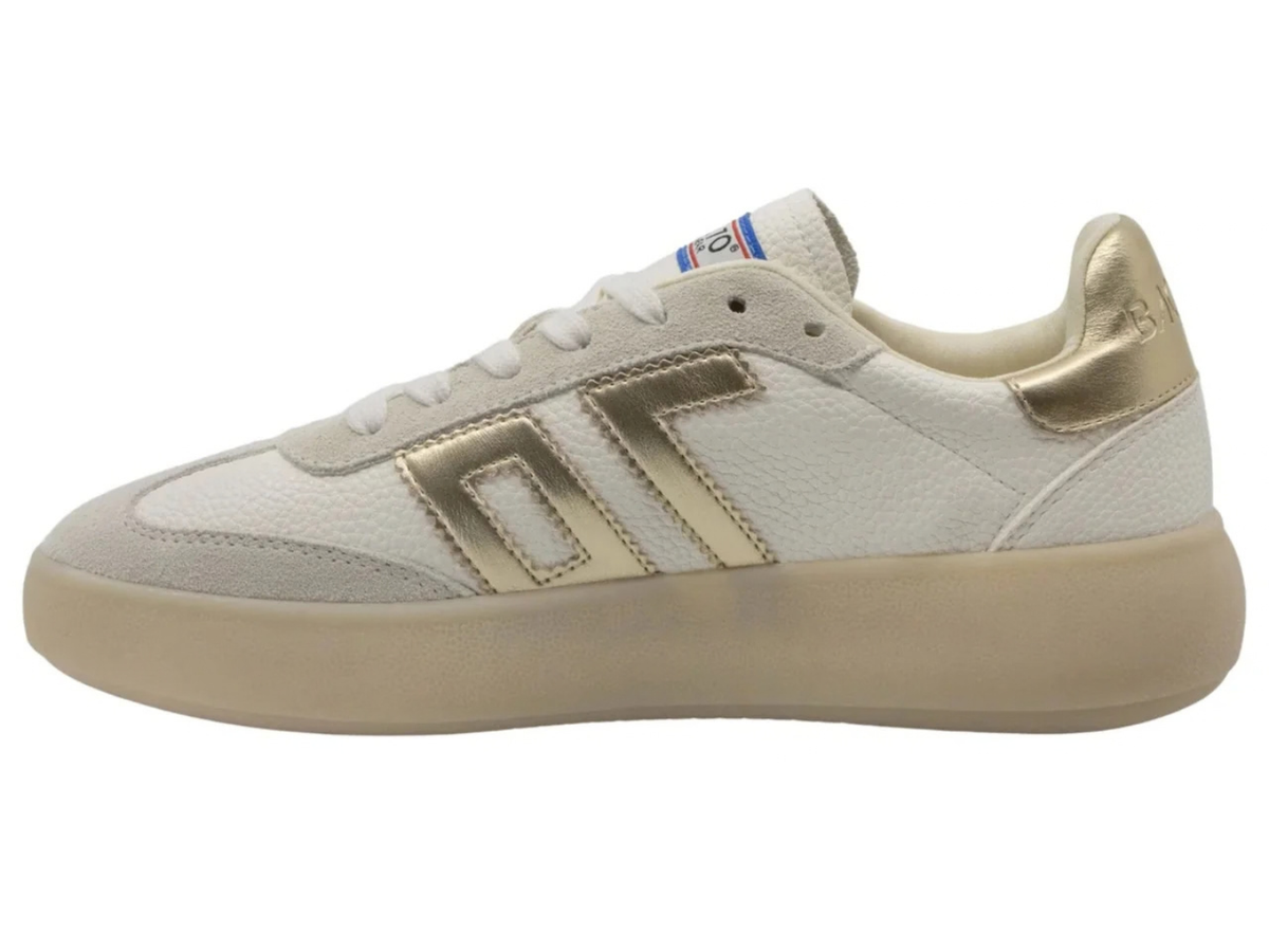 white and gold back 70 sneakers at jcole shoes tulsa