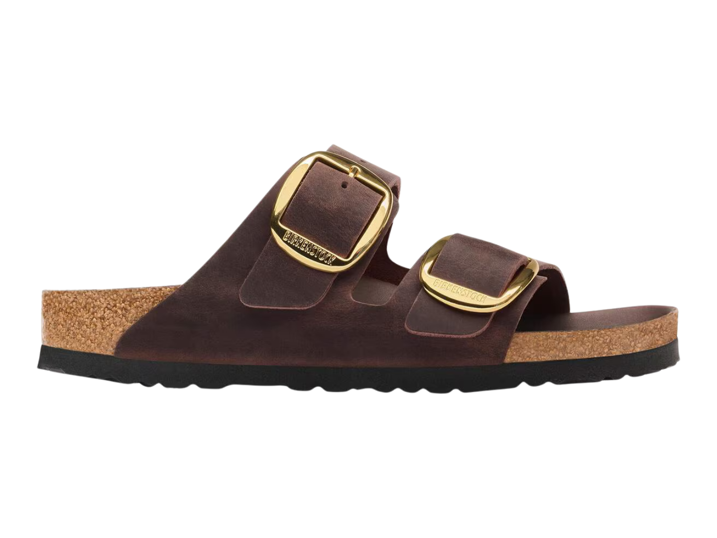 A dark brown double-strap slide sandal with gold-tone metal buckles and a natural cork midsole, shown in profile against a plain white background.