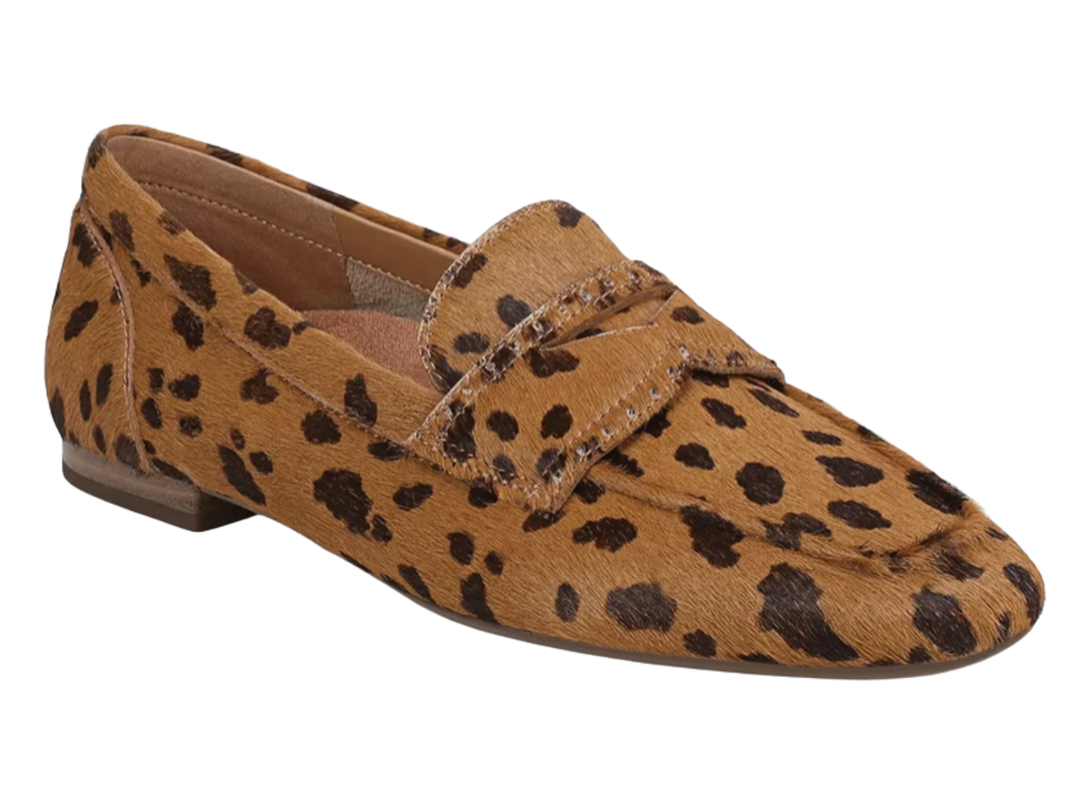A single tan and black leopard-print loafer shoe on a solid white background.
