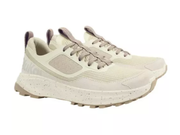 A pair of off-white and beige athletic sneakers with speckled soles, shown against a plain white background.