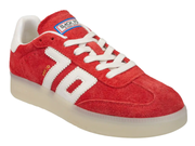 A red suede sneaker with white side stripes, white laces, a white heel tab, and a translucent cream-colored sole. The tongue label shows 'BACK TO SCHOOL' and the side has a small gold 'MCMXIII' detail.