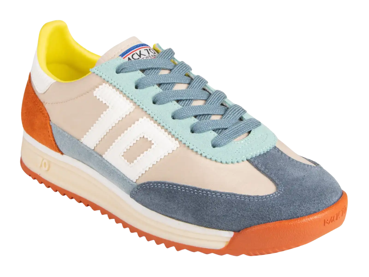 A Kalliope brand retro-style sneaker featuring a color-blocked design with beige suede, slate blue suede, light blue mesh, orange rubber accents, a cream midsole, and a bright yellow interior lining.