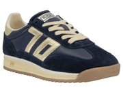 A single Back To School low-top sneaker in navy blue suede and leather with cream-colored laces, a cream side stripe, and a beige gum sole, shown on a white background.