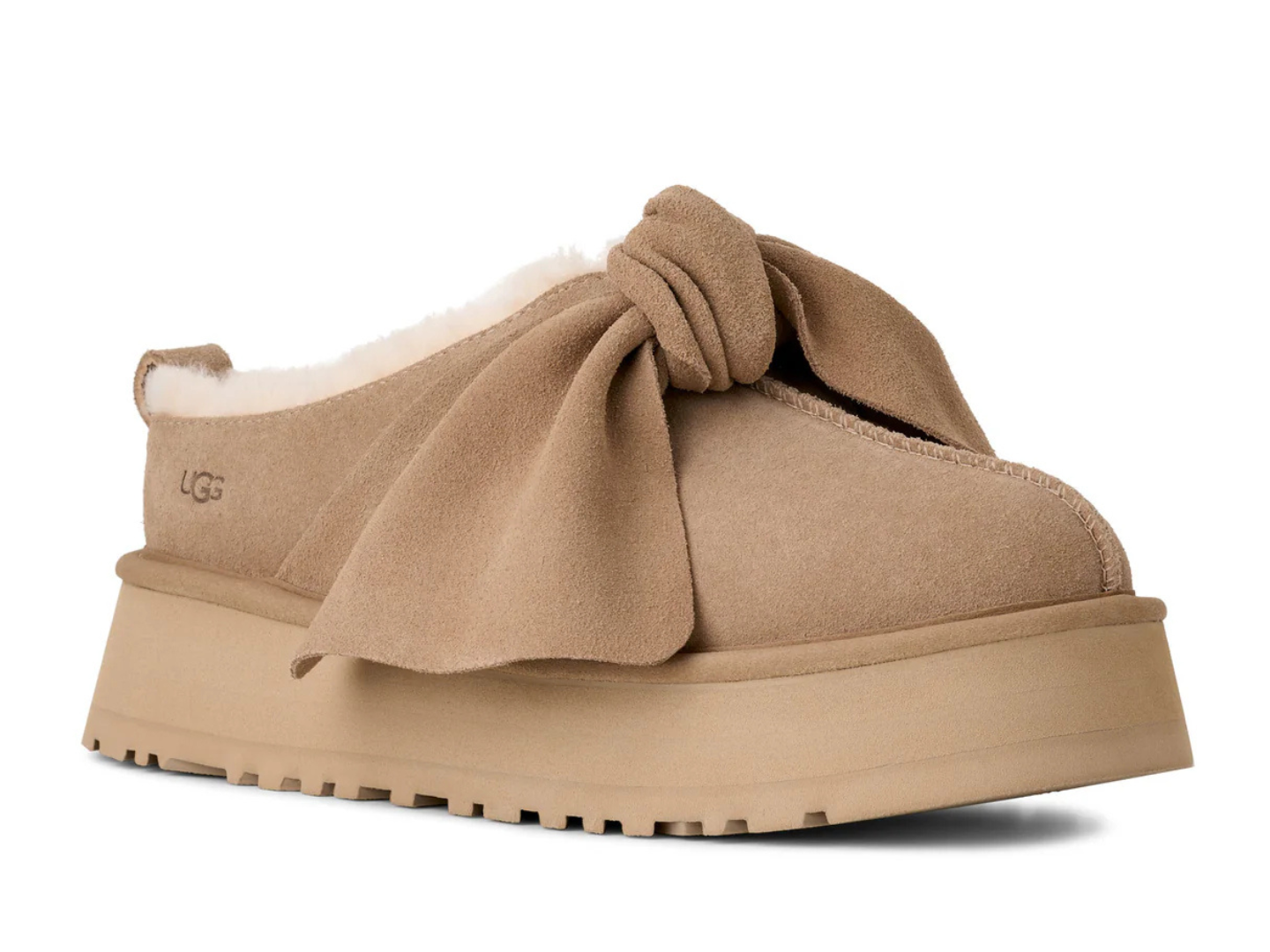 Ugg: Platform Slip On Bow in Sand