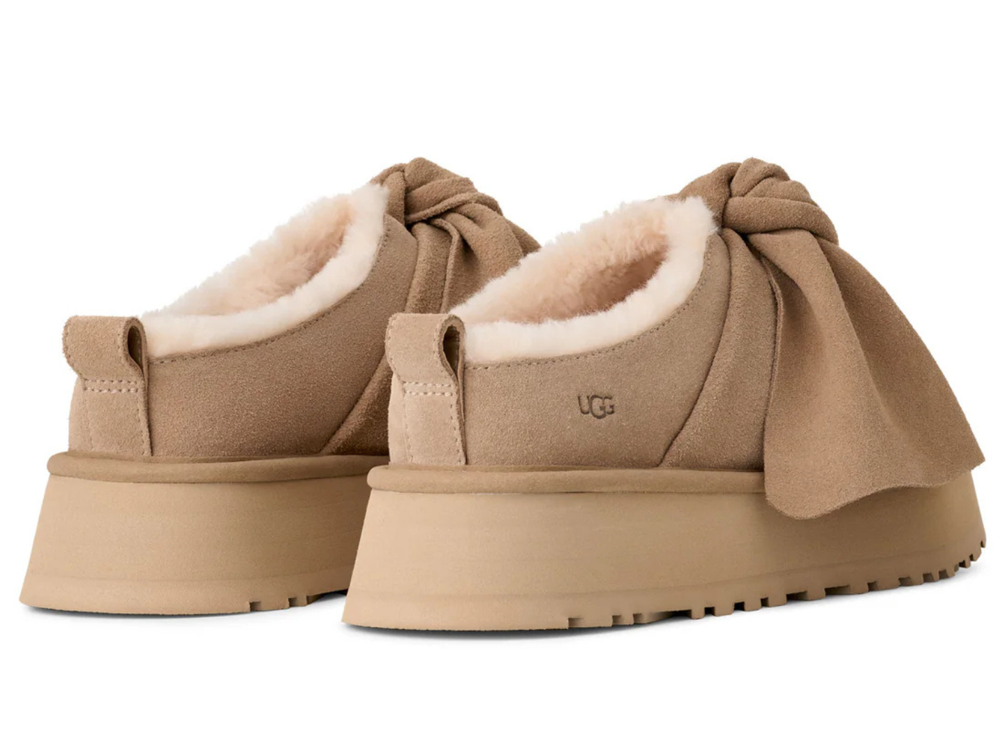 Ugg: Platform Slip On Bow in Sand