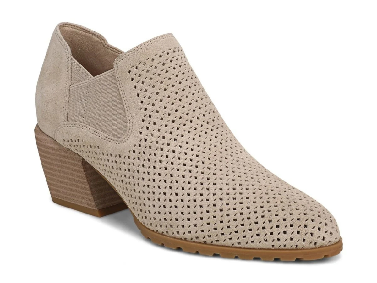 A single beige ankle boot with a perforated upper, elastic side panel, and stacked block heel, shown on a plain white background.