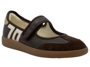 A dark brown and black Mary Jane style shoe with a hook-and-loop strap, a white and black striped '70' on the side, and a brown sole, shown against a plain white background.