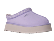 A single UGG slip-on mule shoe in light purple suede with a braided trim and a thick beige platform sole, shown against a plain white background.