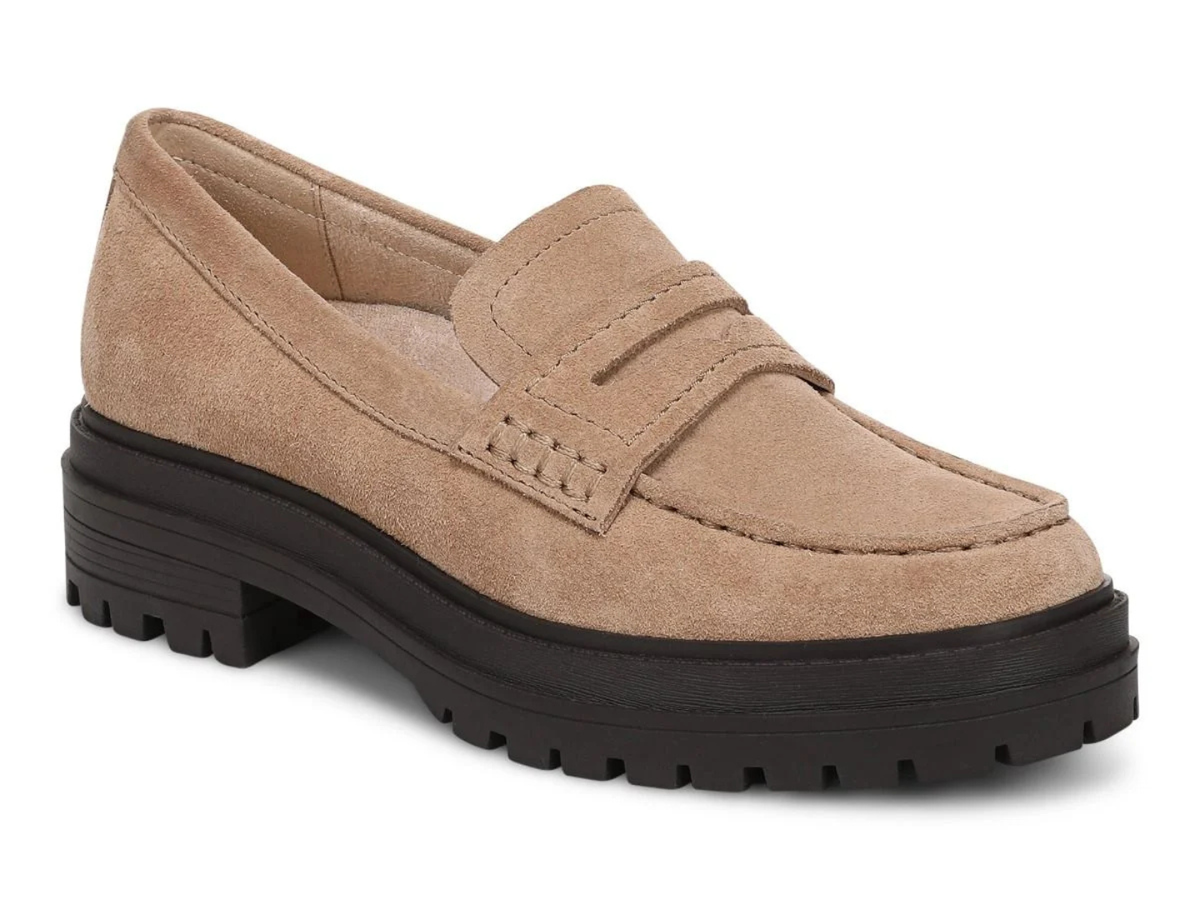 A single tan suede penny loafer with a chunky black lug sole, shown from a three-quarters angle on a white background.