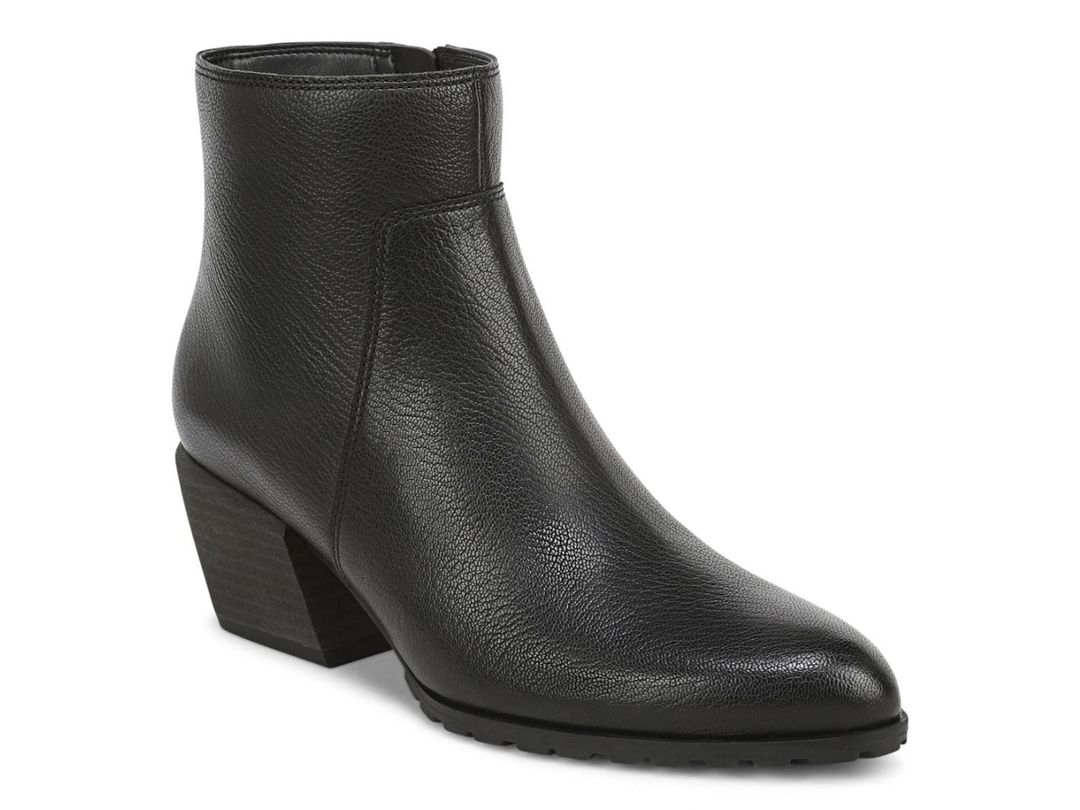 A black leather ankle boot with a chunky block heel and rounded toe, shown from a three-quarters angle on a white background.