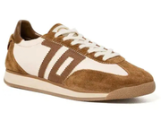 A low-top sneaker featuring a mix of brown suede and off-white leather panels, with white laces and a thick beige midsole and gum sole.